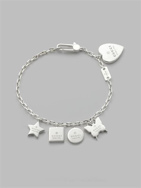 gucci made in italy sterling silver trademark charm bracelet